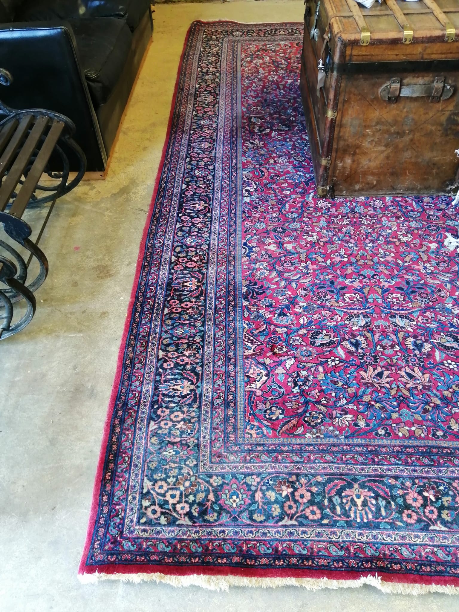 A North West Persian burgundy ground carpet, 364 x 260cm